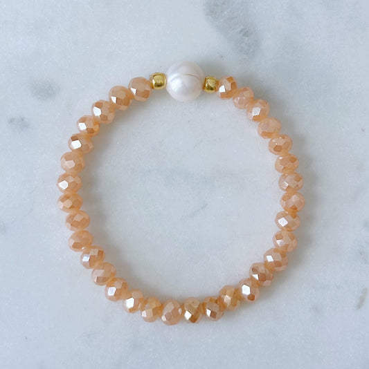 Peach faceted bead and pearl bracelet