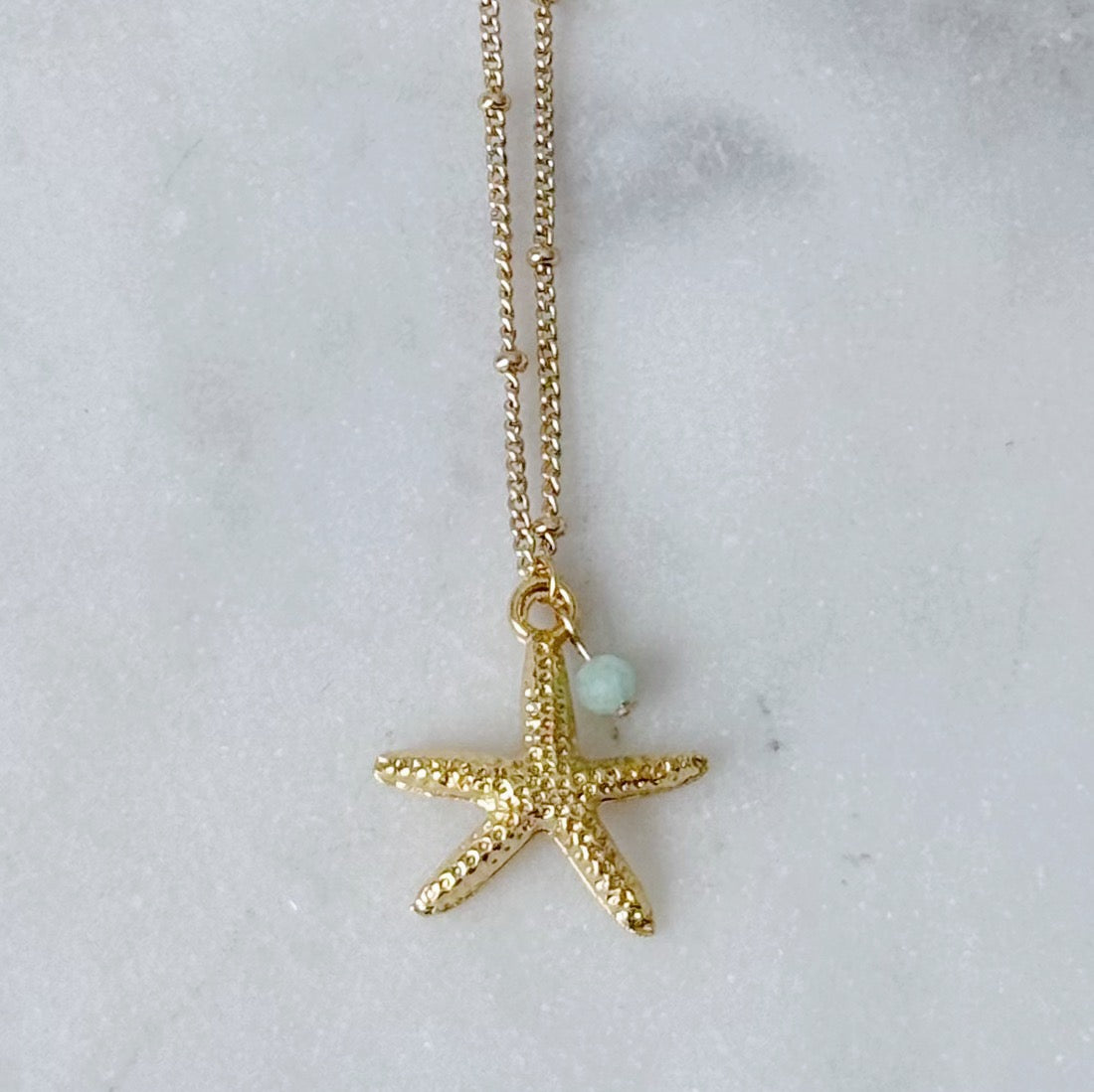 Gold starfish necklace