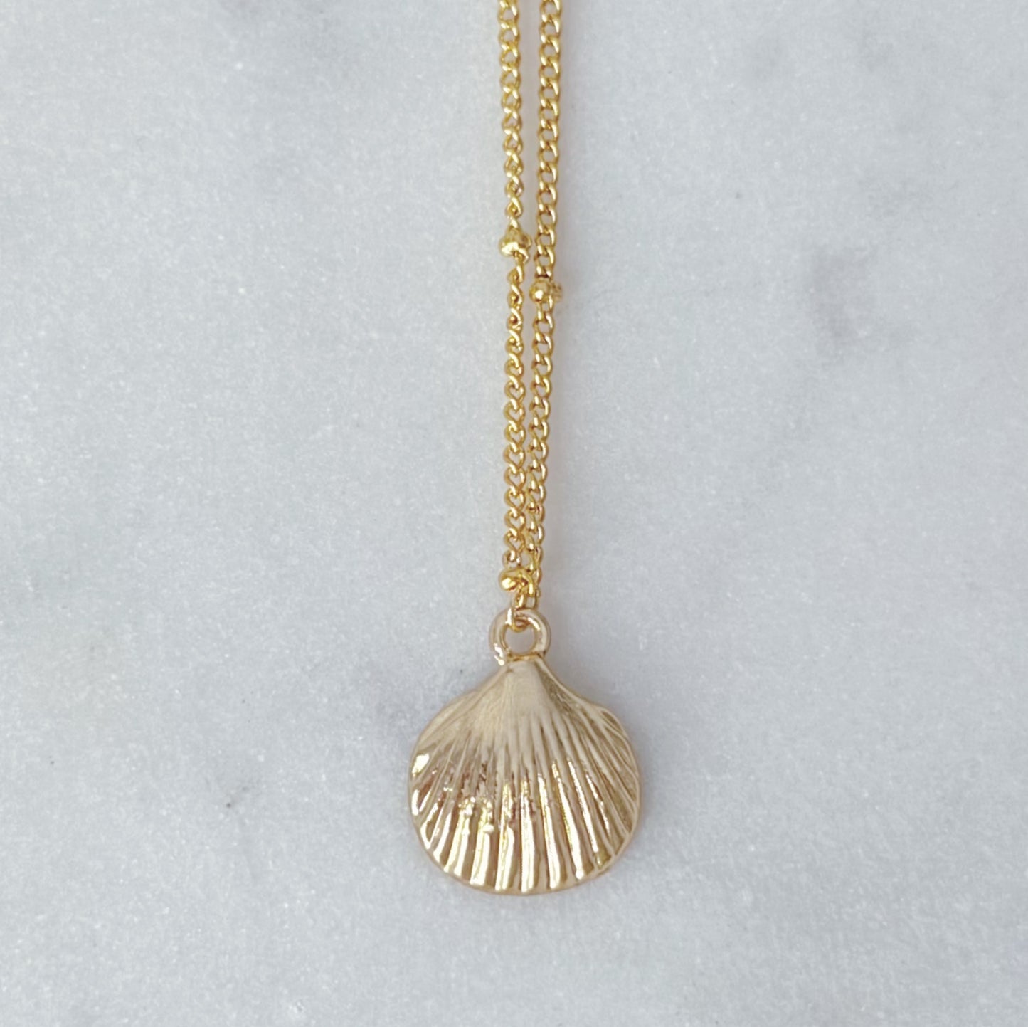 Gold seashell necklace