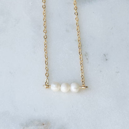 Triple pearl necklace