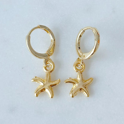 Gold starfish huggie earrings