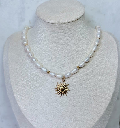 Chunky pearl & gold charm necklace