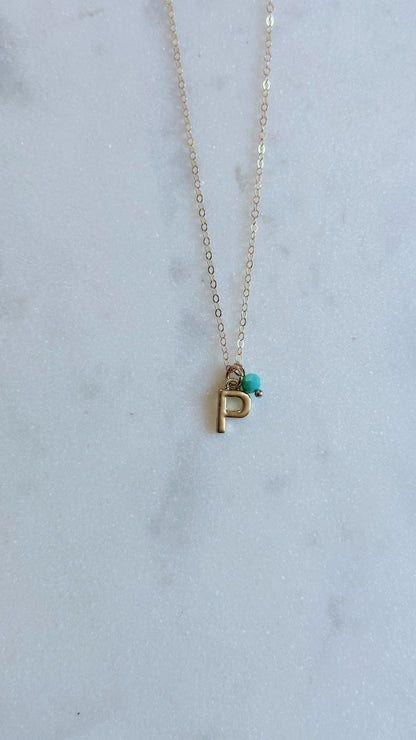 Initial charm necklace with dainty gem