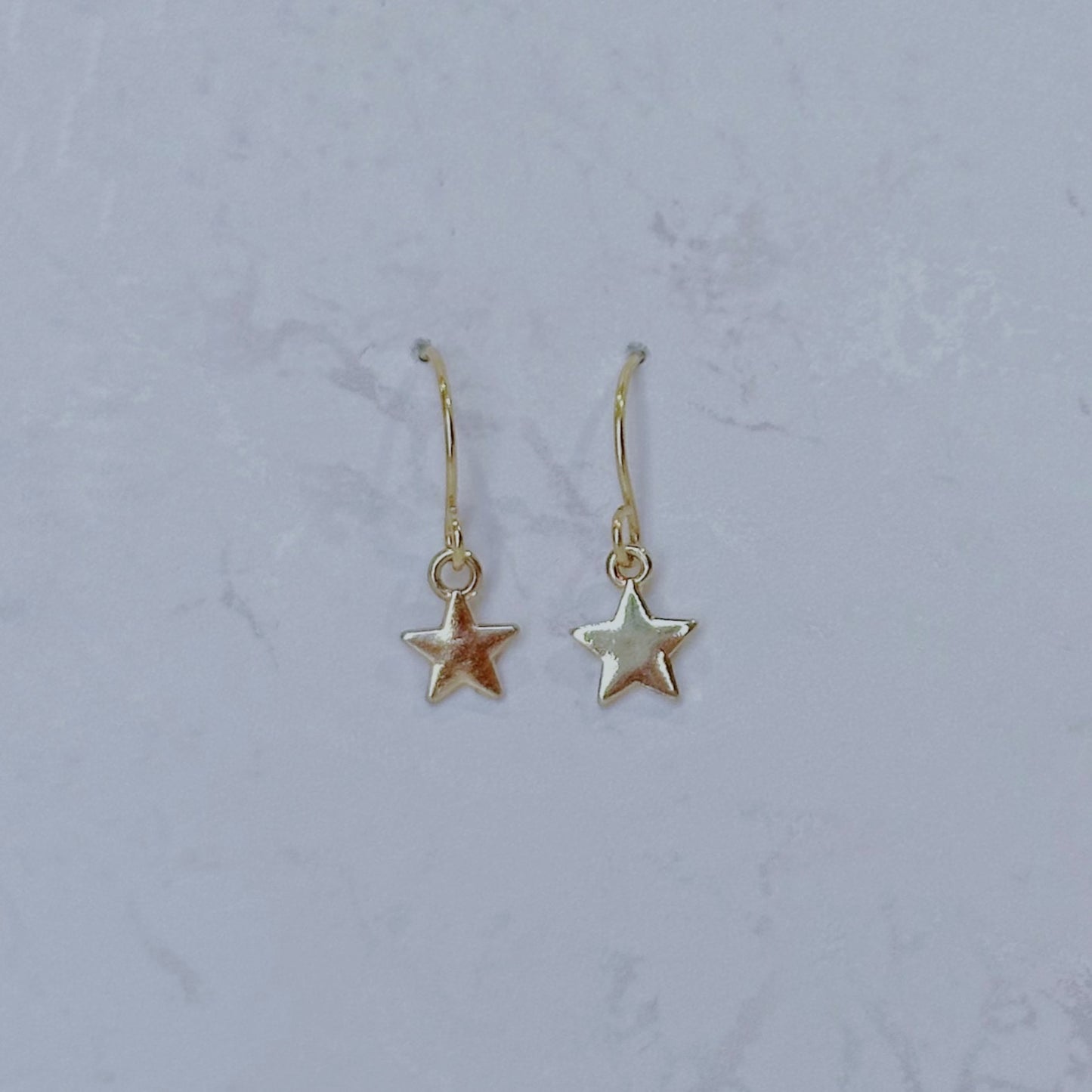 Dainty star dangle earrings