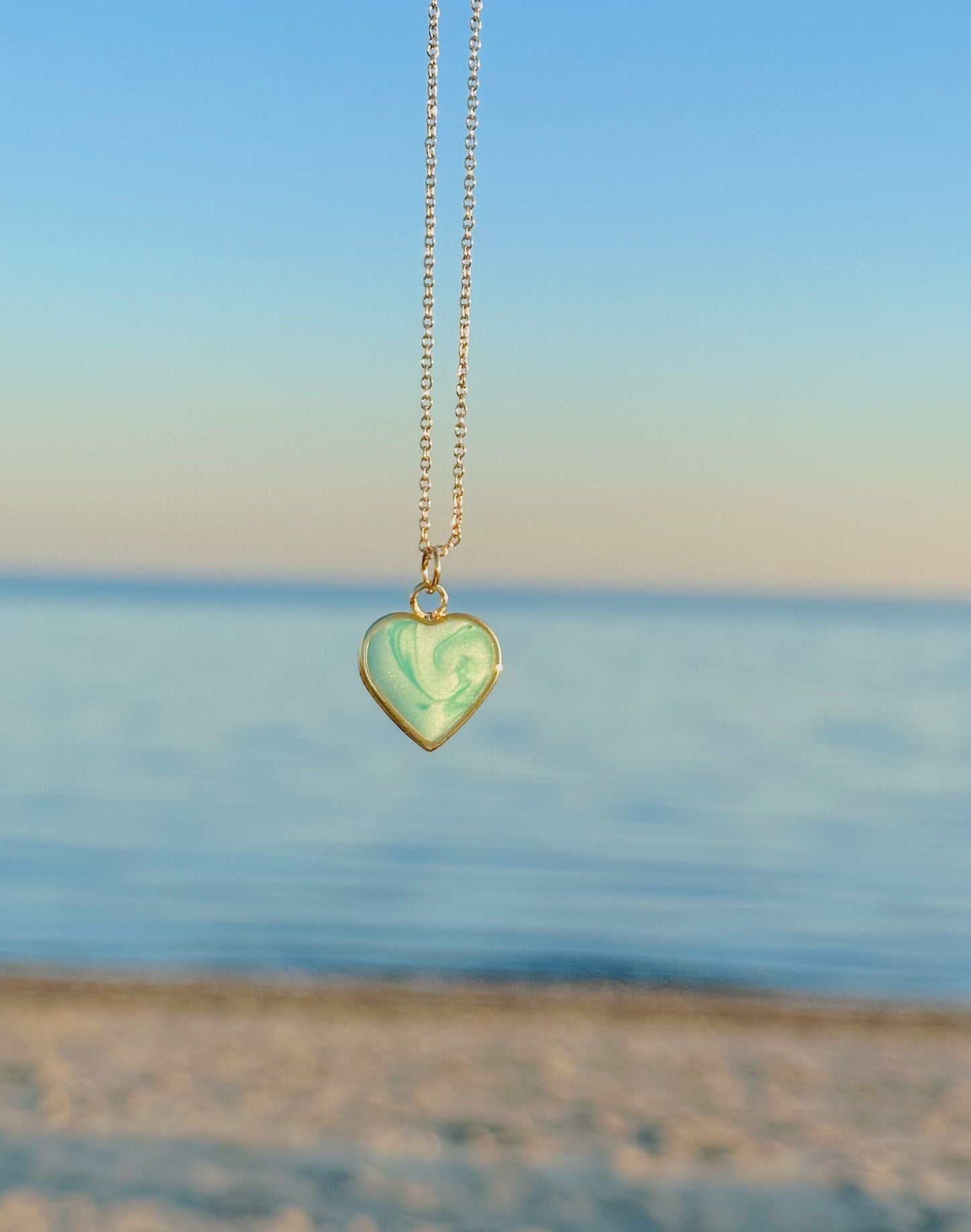 Aqua swirl heart pendant necklace