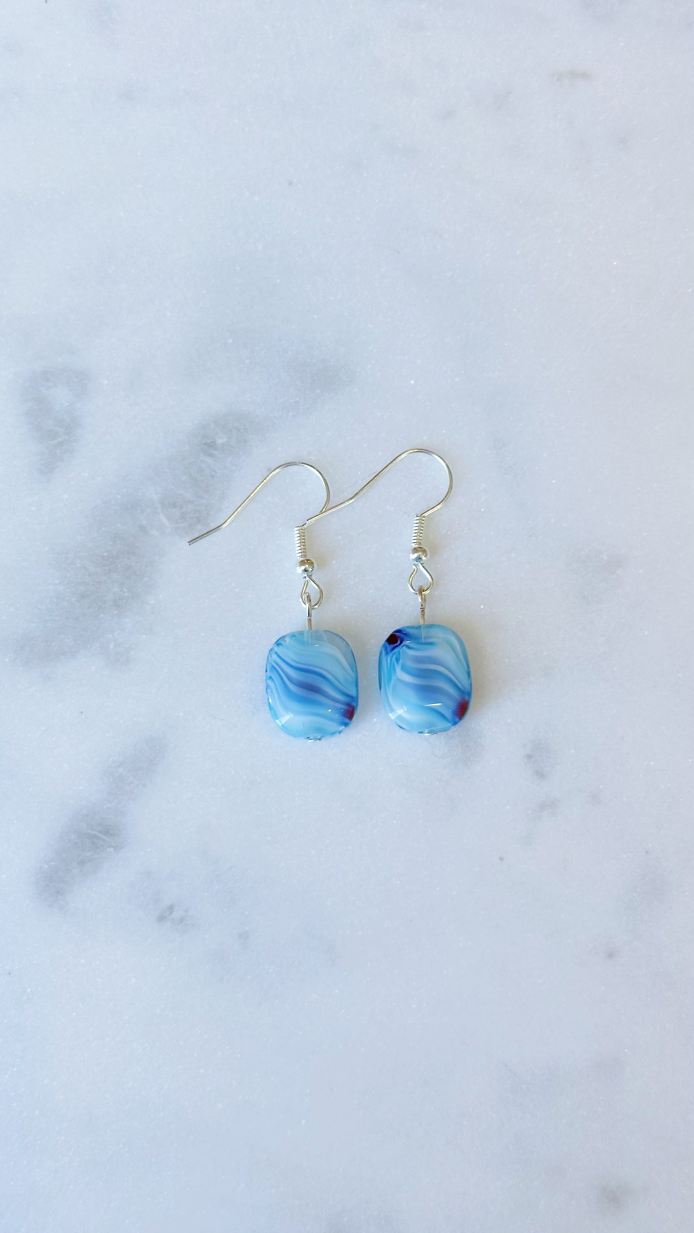 Blue glass swirl dangle earrings – Coastal Beads by Rebecca