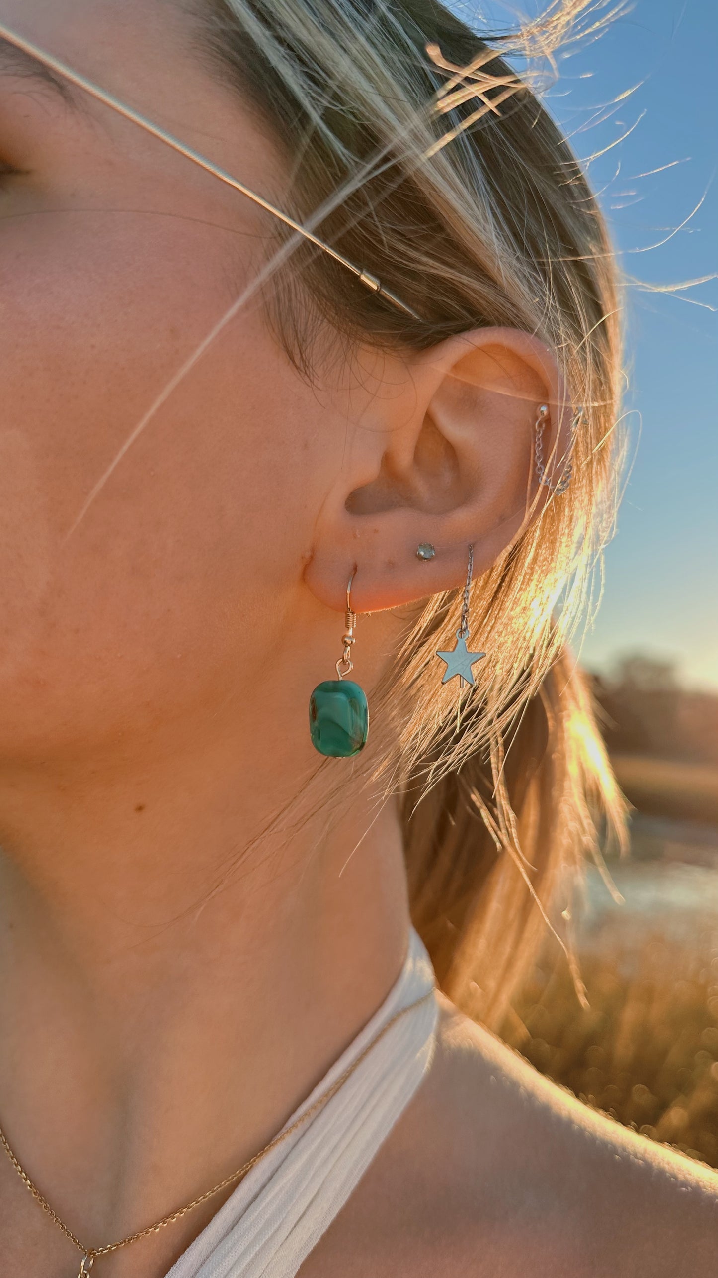 Blue glass swirl dangle earrings
