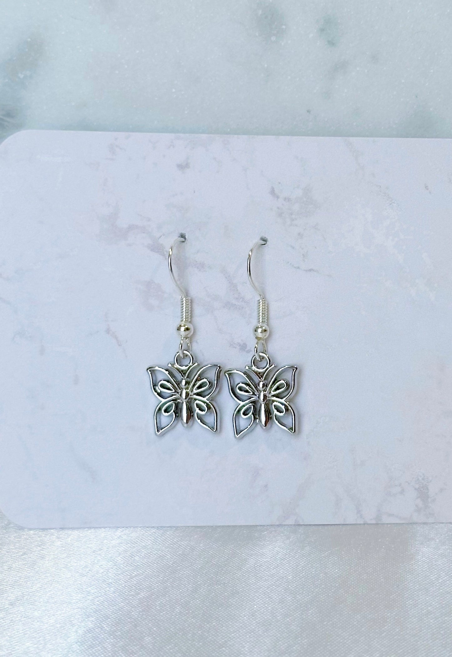 Butterfly charm dangle earrings