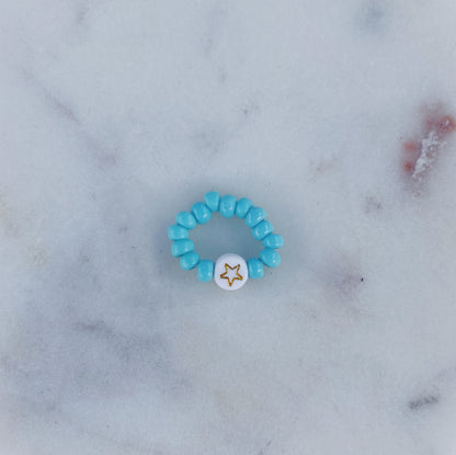 Light blue beaded charm ring