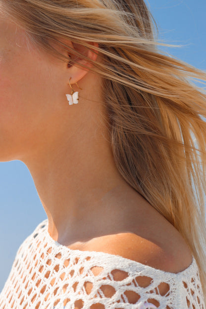 White enamel butterfly dangle earrings
